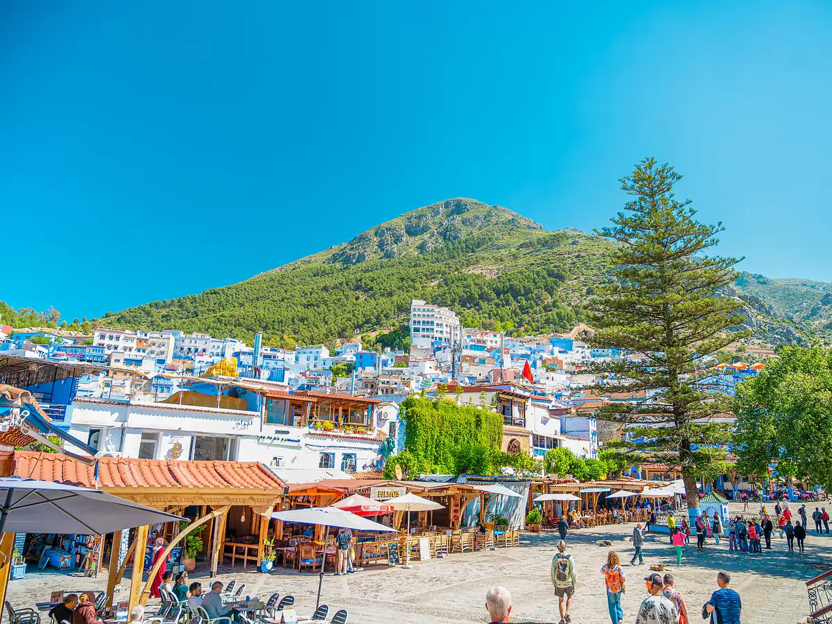 The blue-washed houses of Chefchaouen against the Rif mountains