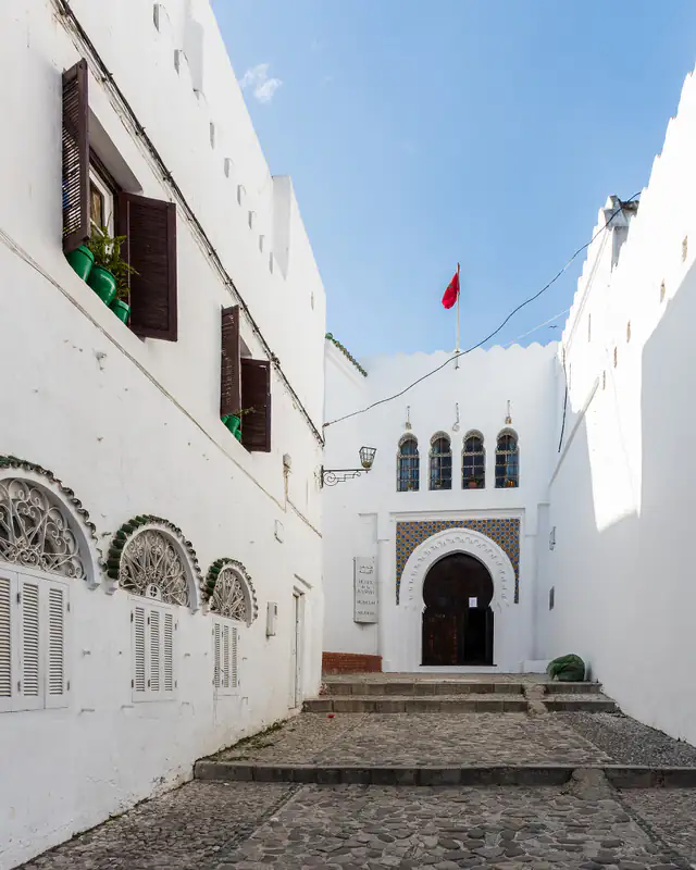 White houses and a carved doorway in the Kasbah of Tangier